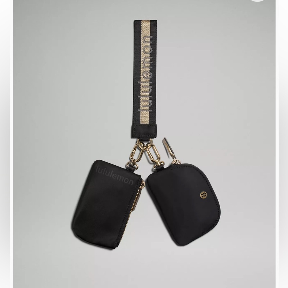 NWT- Lululemon, Dual Pouch Wristlet Wordmark- Black/Gold/White Opal